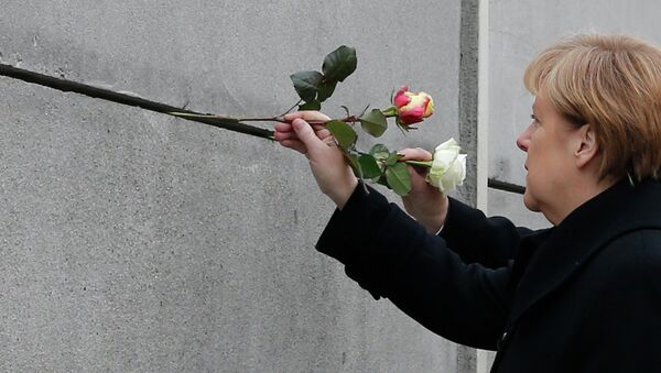 Ангела Меркель почтила память погибших при попытке преодолеть Берлинскую стену, 9 ноября 2014