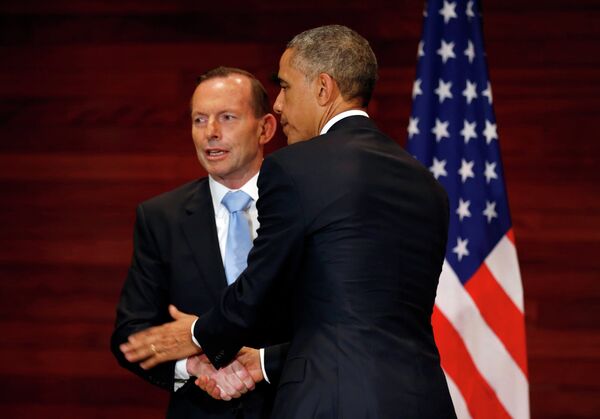 Президент США Барак Обама и премьер-министр Австралии Тони Эбботт на встрече в рамках саммита АТЭС