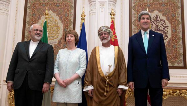 Переговоры в Омане по иранской ядерной программе. Глава МИД Ирана Джавад Зариф, спецпредставитель ЕС Кэтрин Эштон, глава МИД Омана Юсуф бин Алави и госсекретарь США Джон Керри
