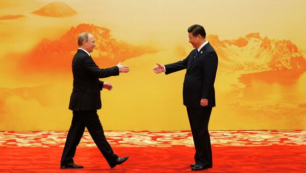 Президент России Владимир Путин и председатель КНР Си Цзиньпин на саммите АТЭС