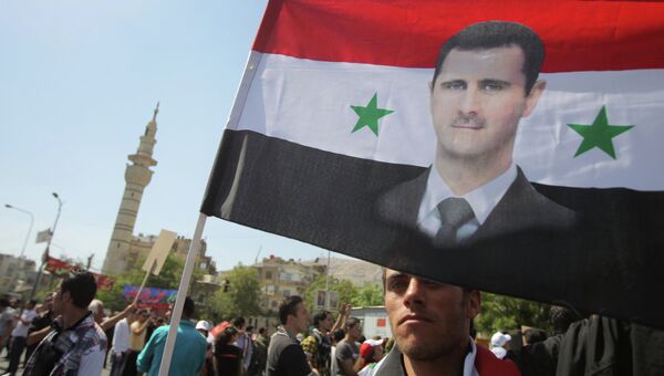 Митинг в поддержку президента Башара Асада в Дамаске