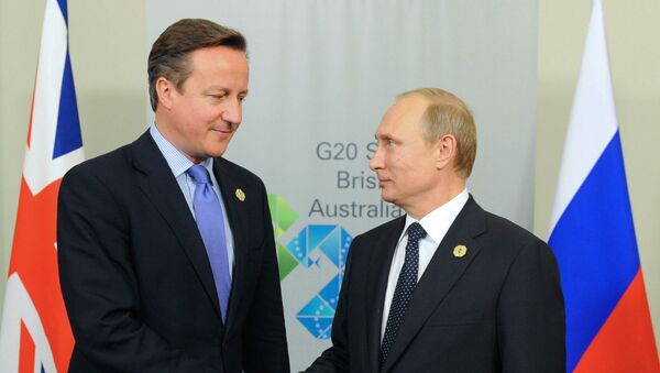 Президент России Владимир Путин (справа) и премьер-министр Соединенного Королевства Великобритании и Северной Ирландии Дэвид Кэмерон во время двусторонней встречи в рамках саммита Группы двадцати в австралийском Брисбене