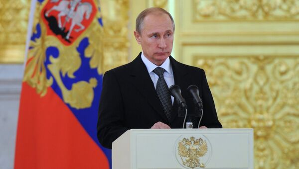 Президент России Владимир Путин выступает на церемонии вручения верительных грамот вновь прибывших послов иностранных государств в Александровском зале Большого Кремлевского дворца