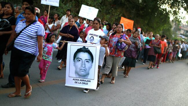 Демонстрация в Мексике с требованием справедливости для пропавших учащихся в штате Герреро, 23 ноября 2014