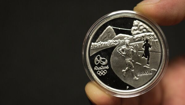 Памятная серебряная монета, выпущенная центробанком Бразилии к Олимпийским играм 2016 года в Рио-де-Жанейро