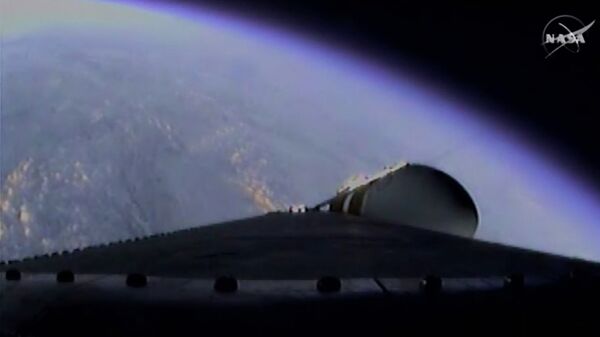 Вид с космического корабля Orion во время выхода на орбиту. Кадр NASA-TV