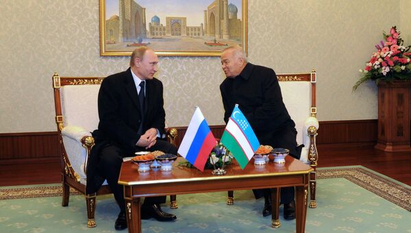 Президент России Владимир Путин и президент Узбекистана Ислам Каримов. 10 декабря 2014