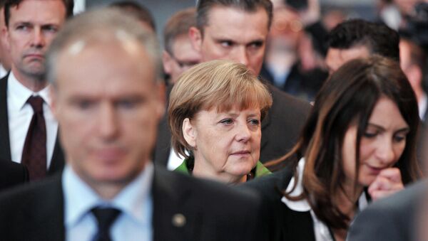Канцлер Германии Ангела Меркель (в центре)