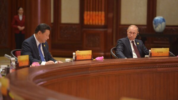 Председатель КНР Си Цзиньпин и Президент России Владимир Путин