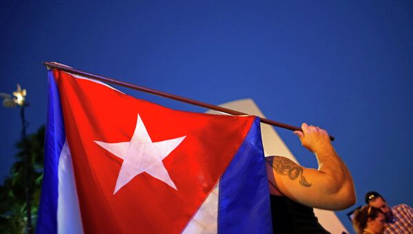 Кубинские эмигранты протестуют в Майами после объявления о восстановлении дипотношений США и Кубы, 17 декабря 2014