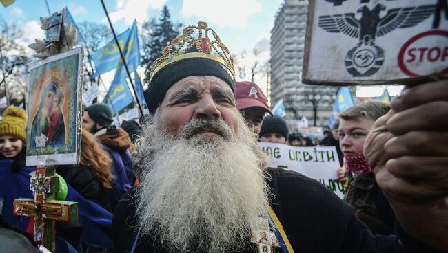 Участник протестного митинга в центре Киева