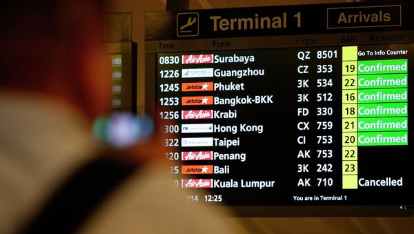 Табло в аэропорту Сингапуре, рейс QZ 8501 авиакомпании Air Asia