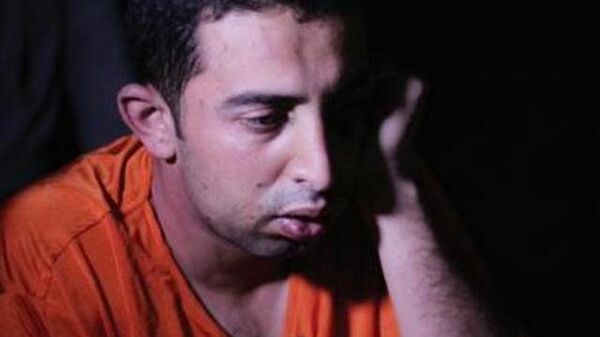 Лейтенант ВВС Иордании Муаз Аль-Касасбех в плену у ИГ