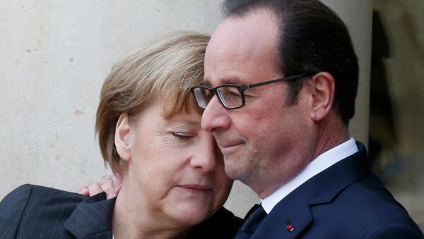 Франсуа Олланд (справа) и Ангела Меркель