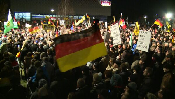 Десятки тысяч людей вышли на антиисламские марши в городах Германии