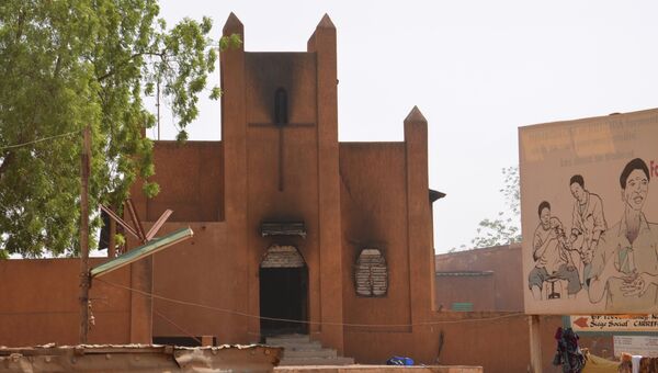 Протестующие против карикатур Мухаммеда в журнали подожгли церковь в Нигере