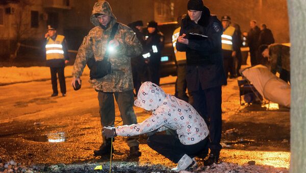 Полиция работает на месте взрыва в Харькове, 19 января 2015