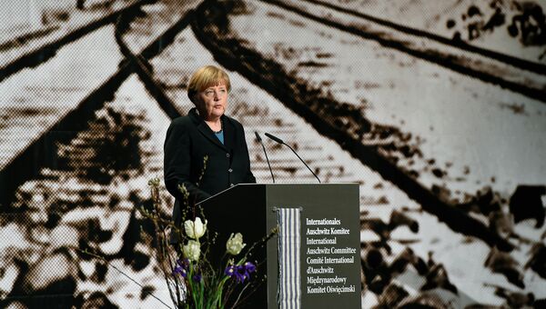 Ангела Меркель во время церемонии, посвящённой памяти жертв фашистского концентрационного лагеря Освенцим