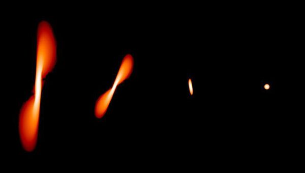 Компьютерная модель того, как черная дыра разрывает съедаемую звезду. Архивное фото