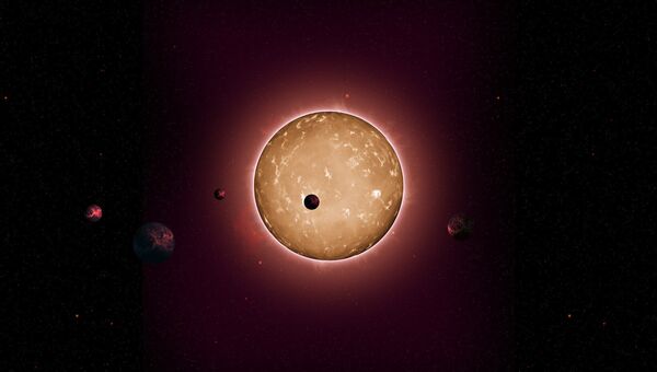 Так художник представил себе престарелую звезду Kepler-444, окруженную пятью планетами