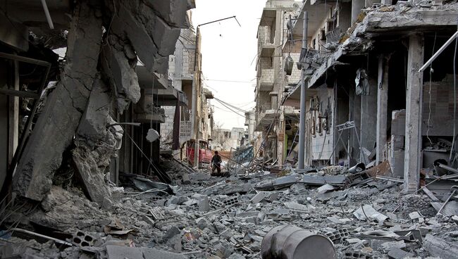 Разрушенная улица в Кобани. Сирия. Архивное фото