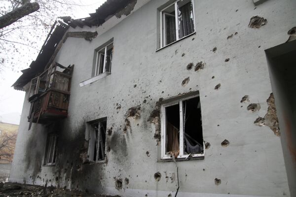 Дом, разрушенный в результате артиллерийского обстрела