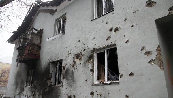 Дом, разрушенный в результате артиллерийского обстрела Донецка