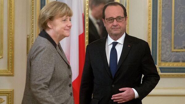 Президент Франции Франсуа Олланд и Федеральный канцлер Германии Ангела Меркель
