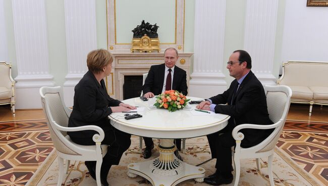 Президент России В.Путин провел рабочую встречу с канцлером ФРГ А.Меркель и президентом Франции Ф.Олландом. Архивное фото.