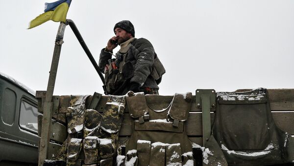 Украинский военный на броне возле города Дебальцево. 10 февраля 2015.