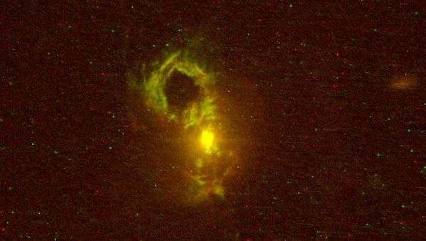 Одна из первых фотографий галактики Чайная чашка, полученная телескопом Хаббл. Архивное фото