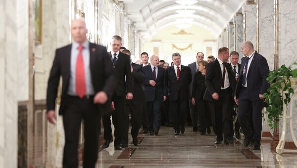 Президент Украины Петр Порошенко, канцлер Германии Ангела Меркель и президент Белоруссии Александр Лукашенко на встрече в Минске. Архивное фото