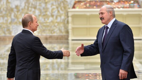 Президент России Владимир Путин и президент Белоруссии Александр Лукашенко во Дворце независимости в Минске