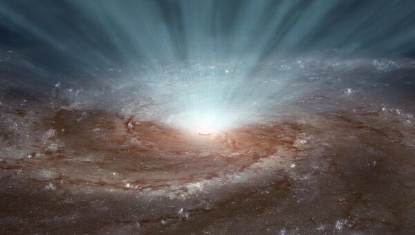 Так художник представил себе черную дыру в центре галактики Вертушка, окруженную сферой из горячего газа