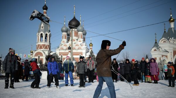 Масленичные гулянья на площади Преображенского кафедрального собора в Бердске Новосибирской области