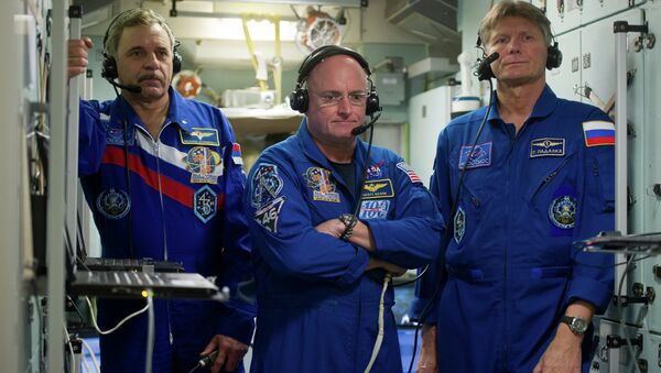 Российские космонавты Михаил Корниенко и Геннадий Падалка и астронавт НАСА Скот Келли