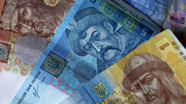 Денежные купюры и монеты Украины
