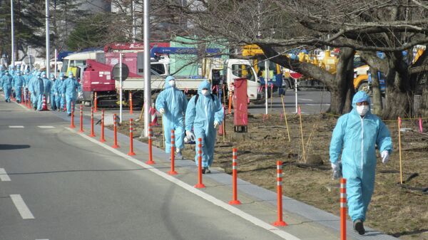 Ликвидаторы аварии на АЭС Фукусима. Архивное фото