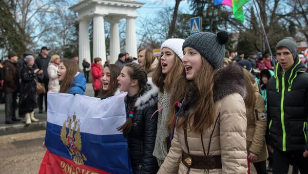 Участники праздничных мероприятий в Севастополе, посвященных годовщине Крымской весны