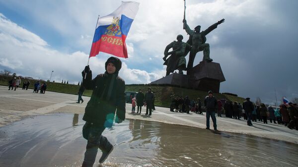 Участники праздничных мероприятий в Севастополе, посвященных годовщине Крымской весны. Архивное фото