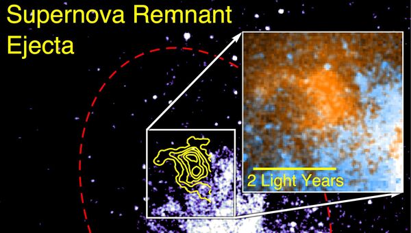 Оранжевым цветом на фотографии отмечены скопления пыли в останках сверхновой