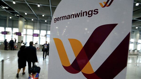 Логотип на стенде авиакомпании Germanwings в аэропорту Дюссельдорфа