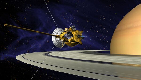 Так художник представил себе Кассини, прибывающий к Сатурну и его спутникам