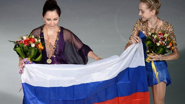 Россиянки Елизавета Туктамышева, завоевавшая золотую медаль, и Елена Радионова, завоевавшая бронзовую медаль
