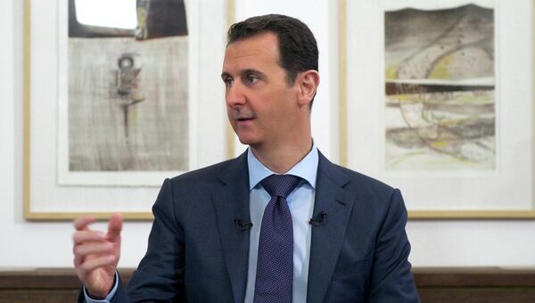 Президент Сирии Башар аль-Асад во время встречи с российскими журналистами