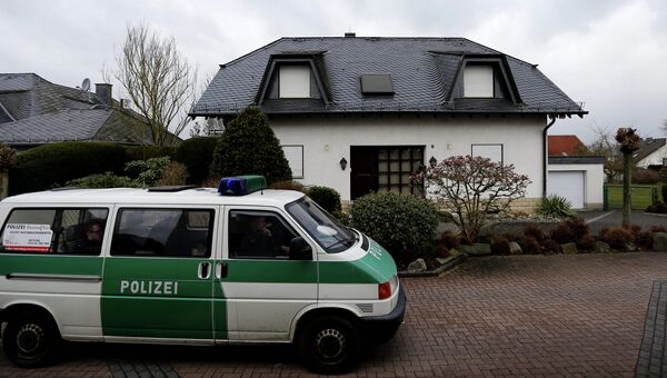 Полиция возле дома Андреаса Лубитца в Германии