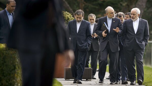 Заместитель министра иностранных дел Ирана Аббас Арагчи, руководитель иранской Организации по атомной энергии Али Акбар Салехи и министр иностранных дел Ирана Джавад Зариф