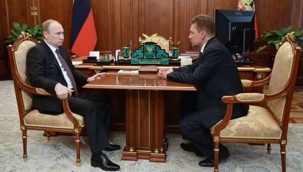 Президент России Владимир Путин и председатель правления ОАО Газпром Алексей Миллер во время встречи в Кремле. Архивное фото