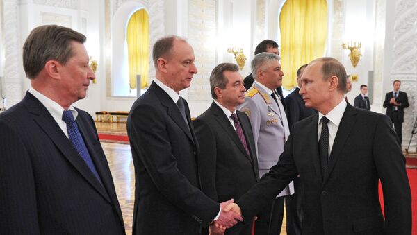 Президент России Владимир Путин на встрече с высшими офицерами и прокурорами в Кремле. 9 апреля 2015