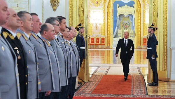 Президент России Владимир Путин на церемонии представления высших офицеров в Кремле. Архивное фото